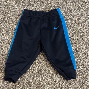 Nike Black Joggers with Bright Blue Side Panels - Kids